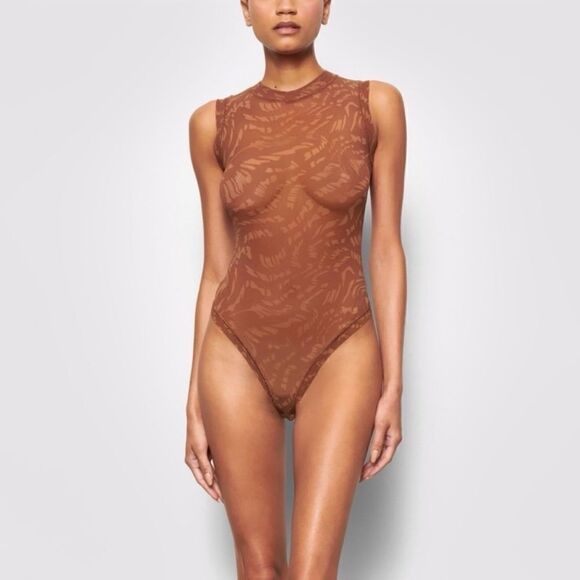 SKIMS Summer Mesh Mock Neck Bodysuit in Latte Swirl - Picture 1 of 7